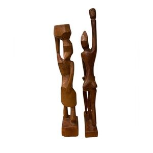 2 carved wood figures